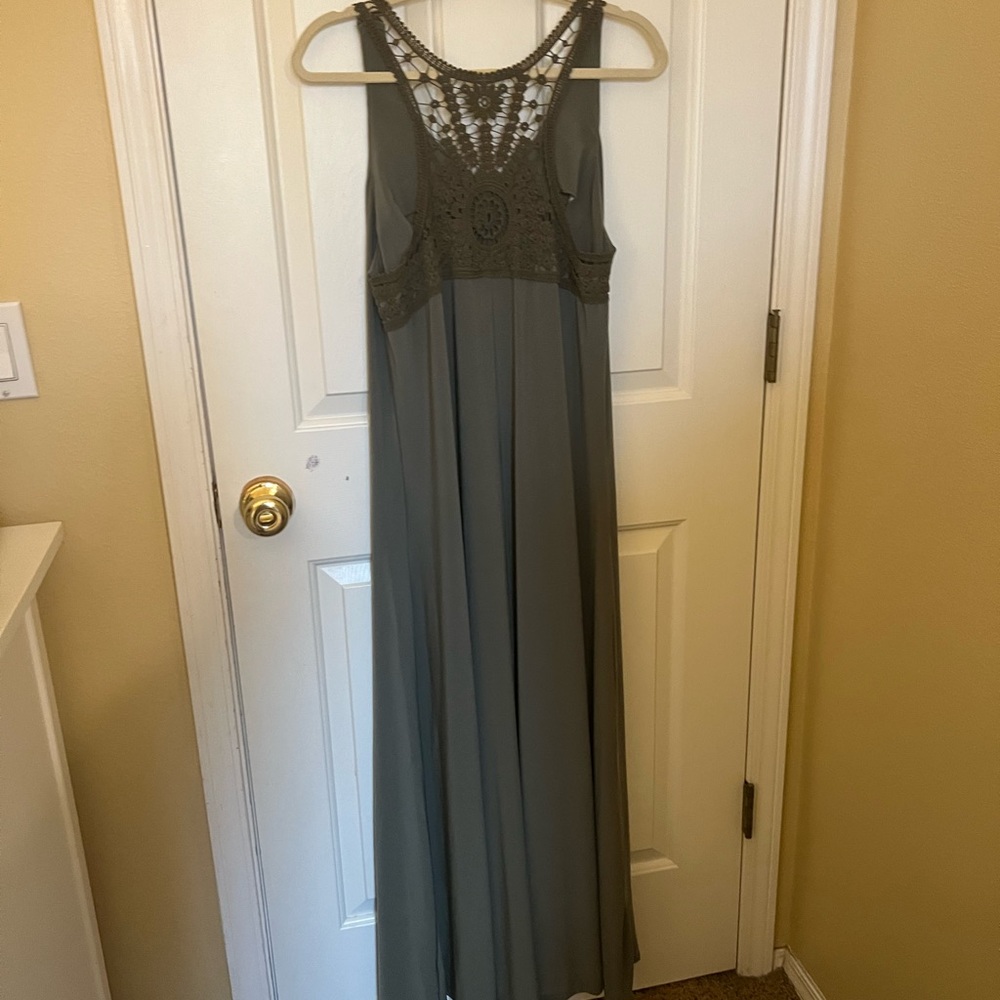 Lane Bryant dress in excellent condition wore it once in size 14/16.Color olive